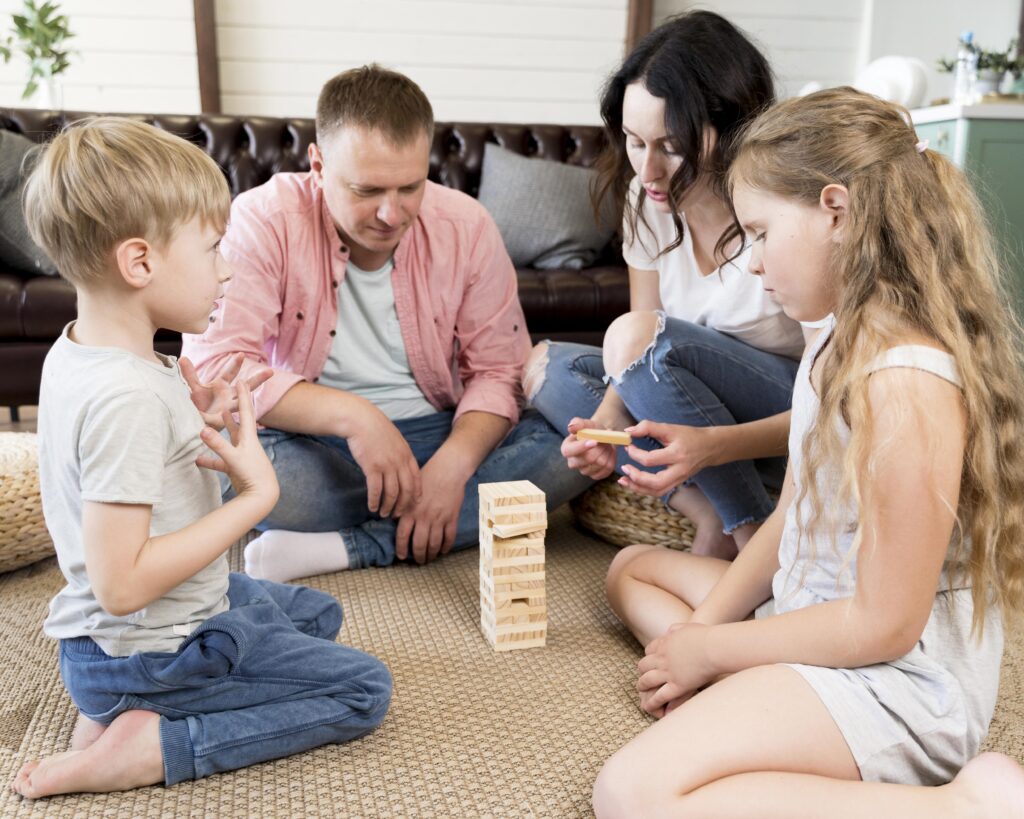 family playing board game together happily showing balance between rules and fun