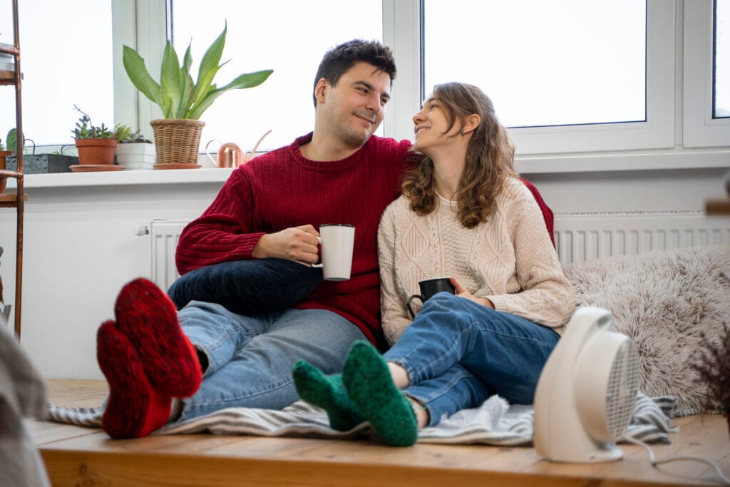 Spouses connecting through a 10-minute check-in ritual, nurturing emotional alignment.
