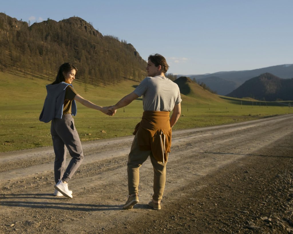 Couple moving forward together, holding onto small proofs of love as signs of life in marriage.