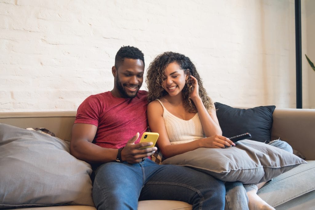 Couple protecting their weekly micro-adventures by scheduling them in advance.