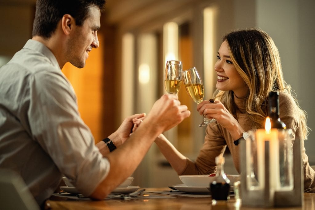 Couple enjoying celebration rituals from their marriage style guide to maintain gratitude and joy.