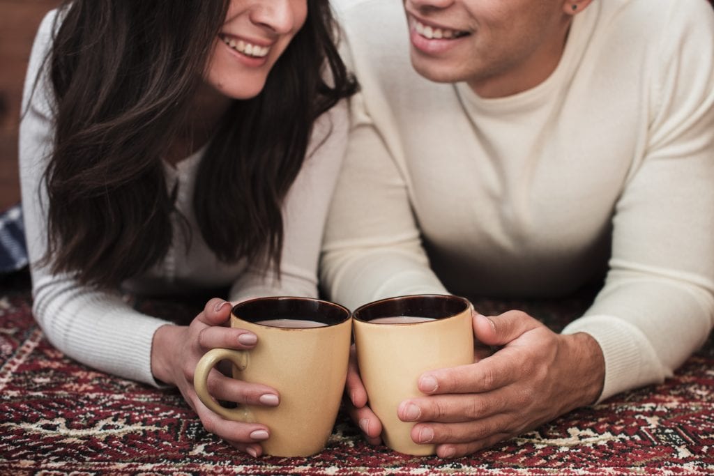 couple celebrating short weekly habit audit together with gratitude
