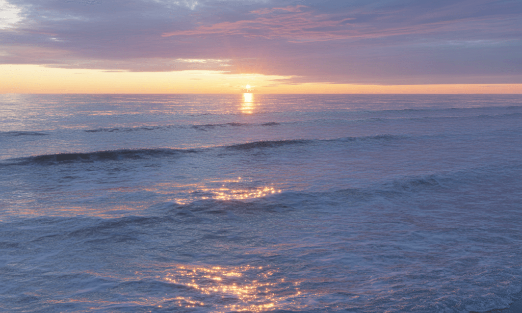 Gentle waves at sunrise, symbolizing God’s design of rhythms and patterns instead of constant willpower strain.