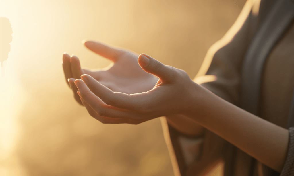 Hands open in acceptance, symbolizing peace and wisdom in marriage.