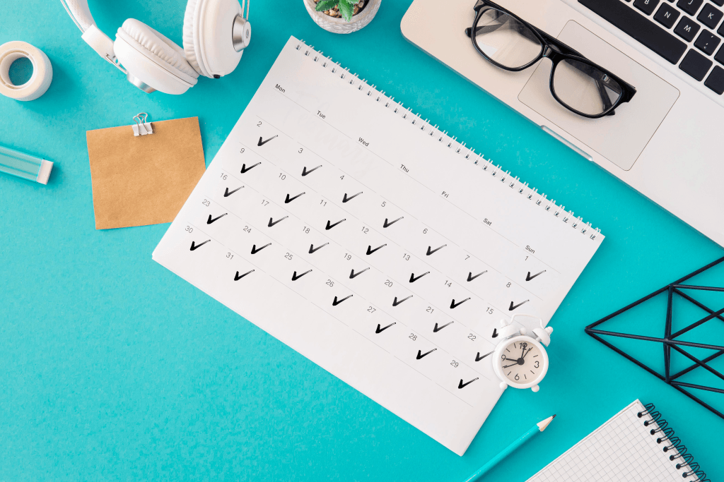 A 30-day calendar filled with checkmarks representing consistent tiny efforts.