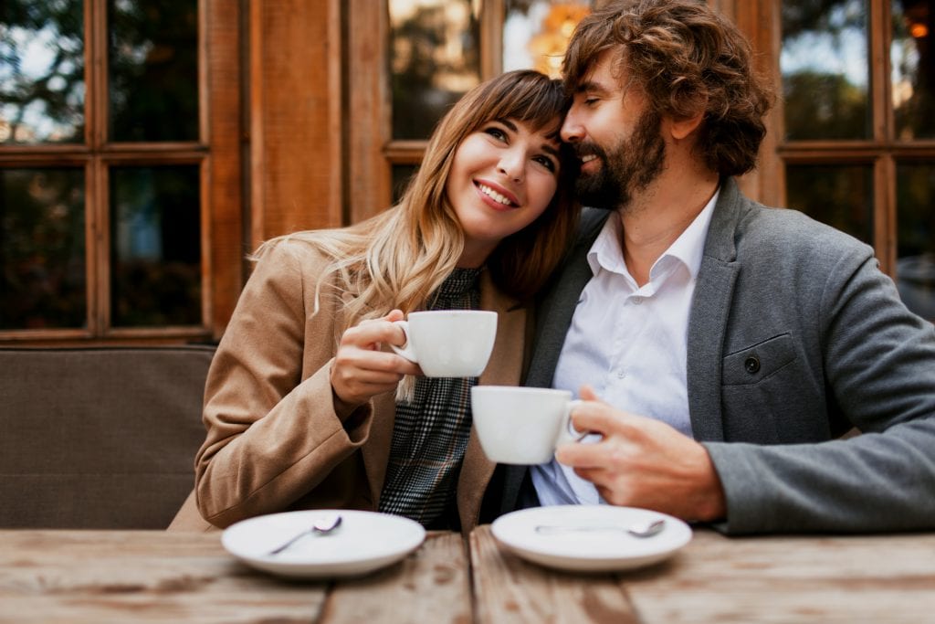 Married couple reviving their weekly coffee date as part of their re-entry ritual.