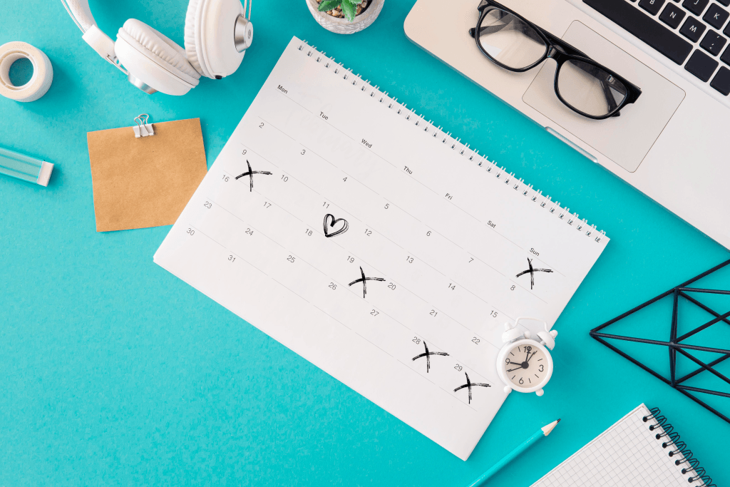 Wall calendar with a recurring heart symbol marking the day of a weekly marriage check-in