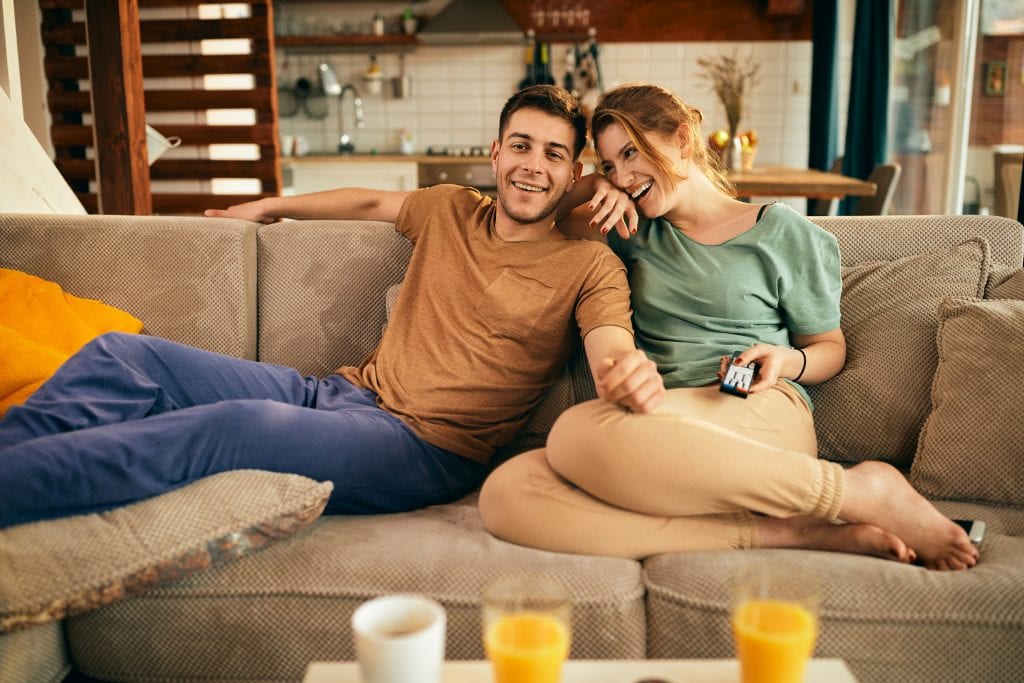 Couple relaxing at home symbolizing small consistent connection habits.