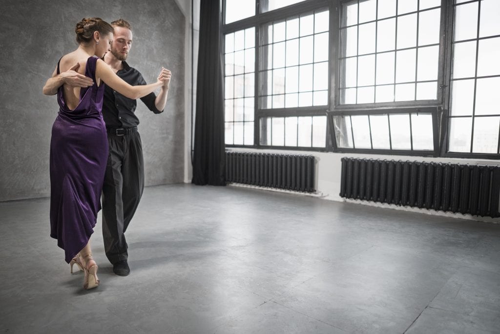 Couple dancing gracefully symbolizing rhythm, balance, and harmony created through forgiveness.