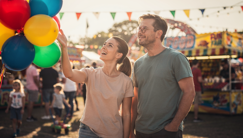 Spouse supporting their partner at a favorite event, demonstrating love through shared experience