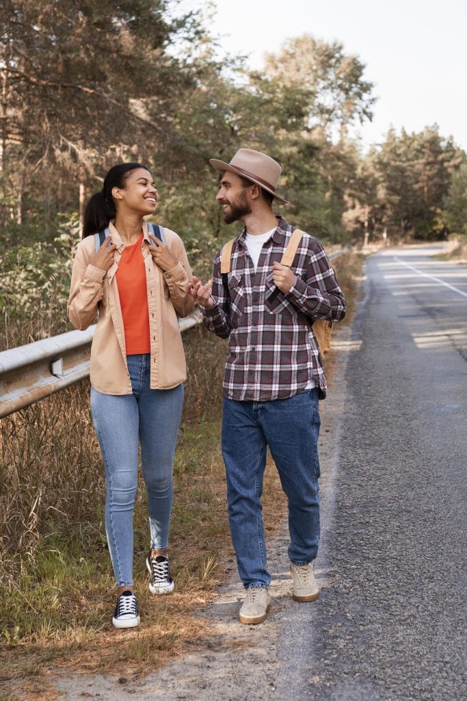 Couple walking and talking slowly on a quiet path, reflecting the choice to slow the conversation down and move forward together