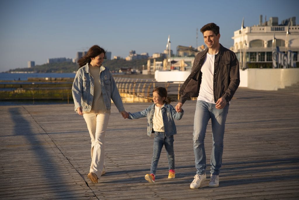Family taking an evening walk together, showing the real-life fruit of working through why “Let’s go for a walk” isn’t simple.