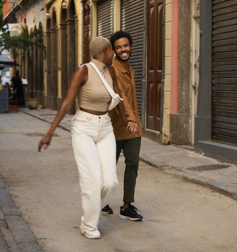 Husband and wife walking together, both learning to Go First in small ways and share a new story of connection.