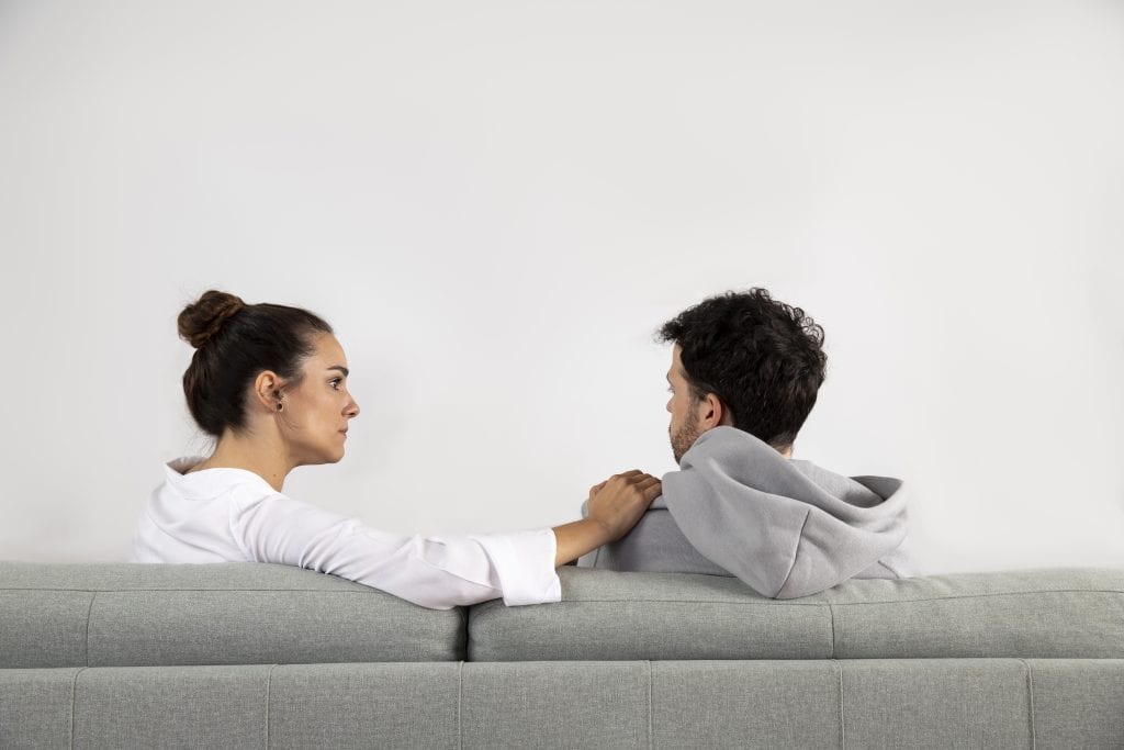 Spouse noticing their partner’s quiet mood and gently checking in, demonstrating emotional Trigger Stacking for Good.