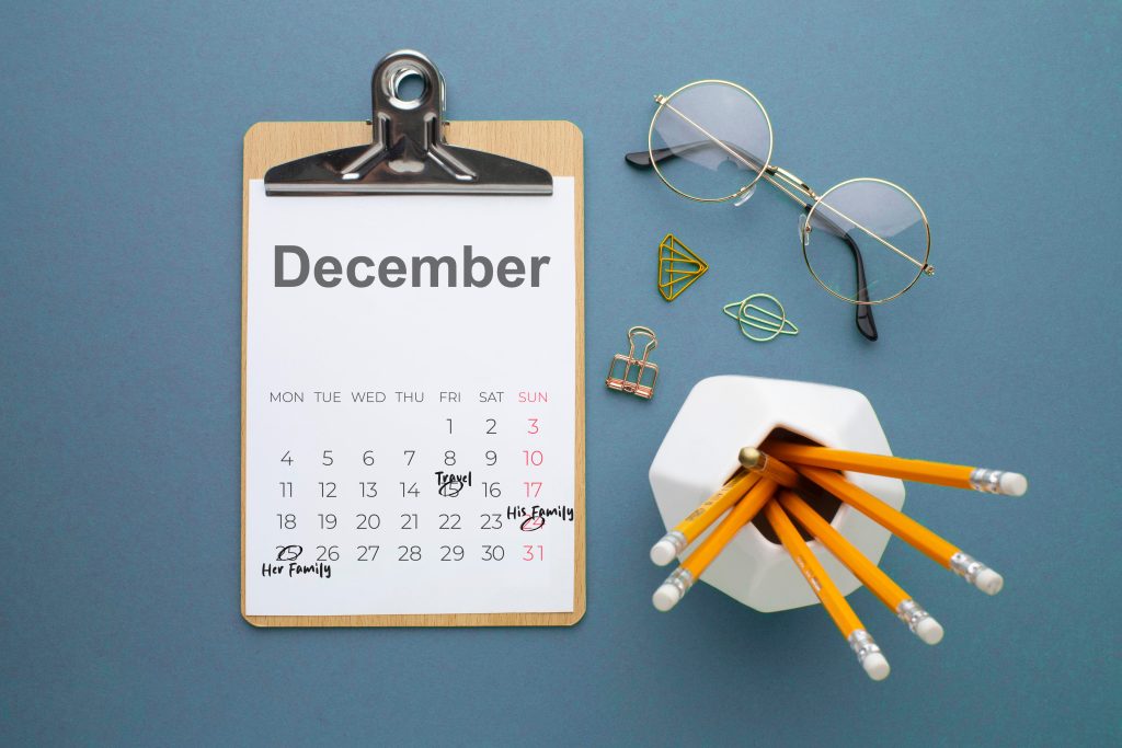 Holiday planning calendar showing the pressure points that feed the holiday war and dread of family time.