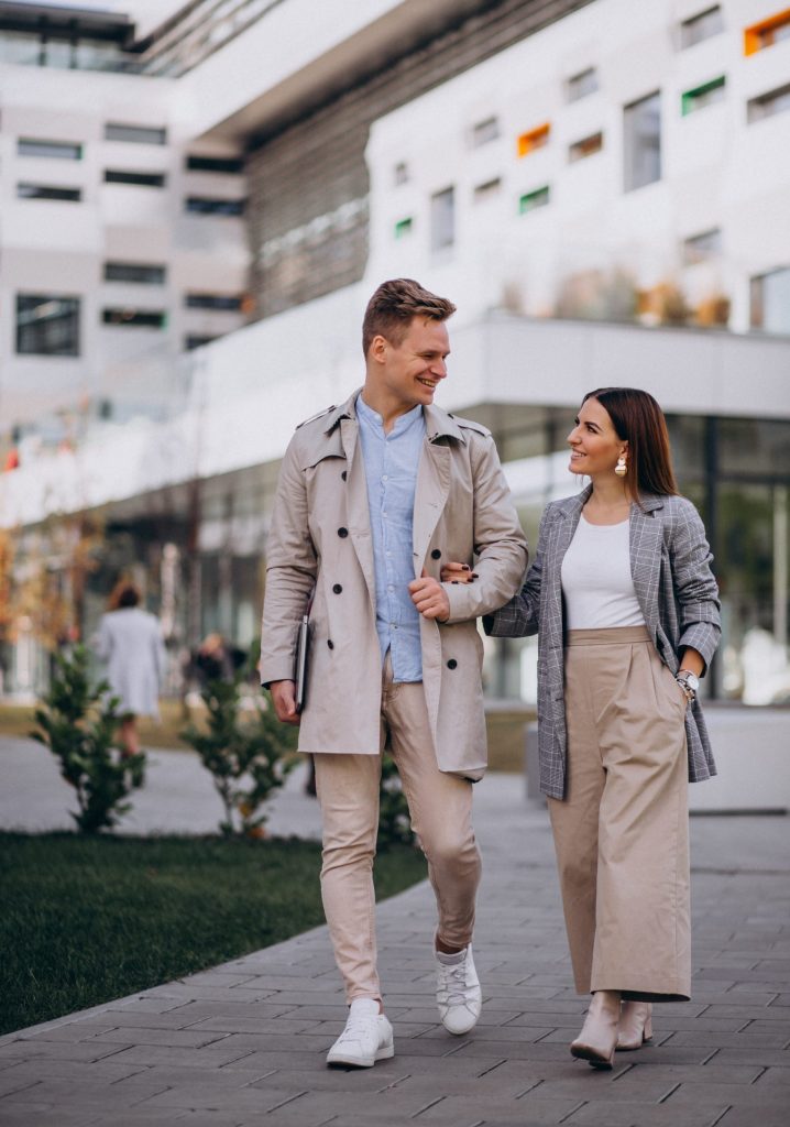 Husband and wife showing mutual respect instead of control as they walk and talk together.